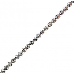 Bracelet rivière de diamant en Or blanc 750. 67 diamants de 1,2mm de diamètre sertis à griffes sur chatons mobiles. Poids ...