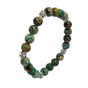 Bracelet Turquoise 8mm Motif Fleur Ce Bracelet est composé 20 perles 8mm Turquoise Africaine 5 intercalaires métal représe...