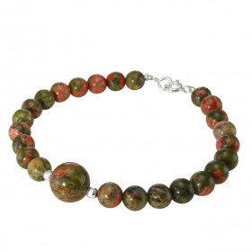 Bracelet Unakite 6-10mm et Argent. Ce bracelet est composé de pierres de 6mm et d'une pierre de 10mm en son centre. Elle e...