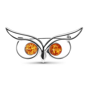 Broche Argent Chouette Ambre Chaque oeil est composé d un ambre rond 8mm Dimensions du motif : 50x25mm Attention ce bijou ...