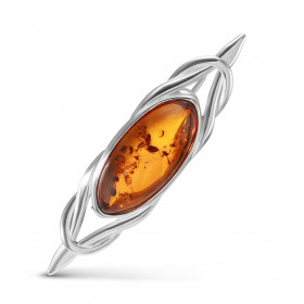 Broche Argent Motif Celtique Ambre Ambre couleur cognac Dimensions du motif : 40x10mm Attention ce bijou est une broche, i...