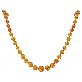 Collier avec des perles d&#39;ambres allant de 5 à 12mm de diamètre et des perles d&#39;argent de 2mm de diamètre. Ambre d...