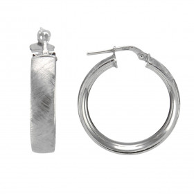 Créoles argent rhodié brossé forme cercle 27mm diamètre Section ovale 6mm large Système d attache : tige montée sur une ch...