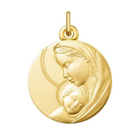  Médaille Vierge à l enfant Or Jaune 375 Finition satinée sur les deux faces Vierge enfant relief Diamètre : 16mm Dimensio...