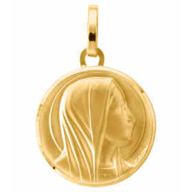 Médaille vierge en Or jaune 750/1000, plaque ronde diamètre 17mm.. Le contour de la plaque est brillant.. Effet satiné sur...
