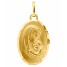 Médaille vierge et enfant en Or jaune 750/1000.. Plaque ovale de 18x13mm.. Effet satiné sur les deux faces.. Le contour de...