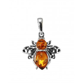 Pendentif en argent en forme d'abeille avec 2 ambres qui forment le corps. Ambre de couleur cognac. Dimension du pendentif...