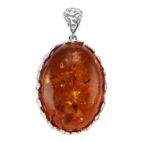 Pendentif en argent avec une ambre de forme ovale de 32x22mm. Ambre de couleur cognac. Dimension du pendentif bélière incl...