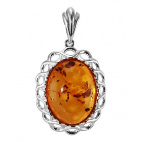 Pendentif en argent avec une ambre de forme ovale de de 14x20mm. Ambre de couleur cognac. Dimension du pendentif bélière i...