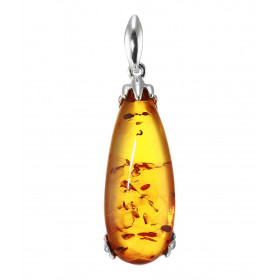 Pendentif en argent avec une ambre en forme de poire de 12x30mm. Ambre de couleur cognac. Dimension du pendentif bélière i...