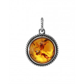 Pendentif argent une ambre forme ronde 12mm diamètre un entourage argent torsadé Ambre couleur cognac Dimension du pendent...
