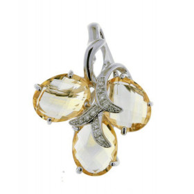 Pendentif Or Blanc 750 citrines Ce pendentif est serti trois citrines ovales 9x7mm (5,1 carats au total) 11 diamants (0,06...