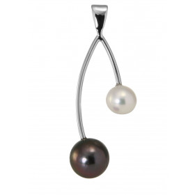 Pendentif en or blanc 750 et perles. Perle blanche ronde de 7mm de diamètre. Perle de tahiti ronde de 9mm de diamètre. Dim...