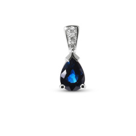  Pendentif Or Blanc 750 serti d un Saphir Bleu Royal AAA Poire 7x5mm 3 diamants Dimensions du pendentif : 13x5.5mm Poids S...