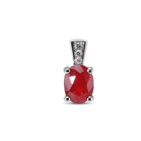 Pendentif en or blanc serti d&#39;un rubis ovale de 8x6mm. 3 diamants sont sertis dans la bélière. Dimensions du pendentif...