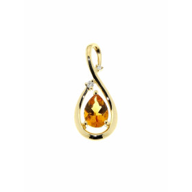 Pendentif Or 750 Citrine serti d'une pierre taille poire de 7x5mm et de deux diamants. Dimensions du pendentif : 20 x 9 mm...