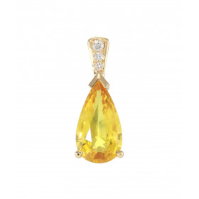 Pendentif en Or Jaune 750 serti d'un Saphir Jaune traité en forme de poire et de diamants. Poids saphir 2.8 carats. 3 diam...