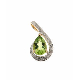 Pendentif Péridot Diamant Or Jaune 375 La pierre centrale est taillée forme poire mesure 6x4mm Elle est maintenue sur cett...