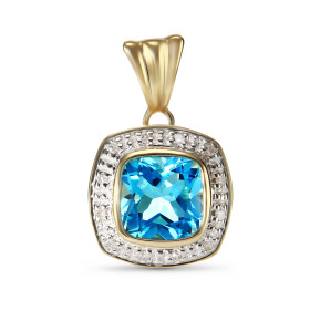 Pendentif Topaze Bleue Traitée et Diamant en Or 375. La pierre centrale est taillée en coussin et mesure 8x8mm. Elle est m...