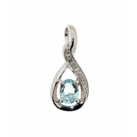 Pendentif Topaze Bleue Traitée Or Blanc 375 La pierre centrale forme ovale mesure 5x3mm Elle est maintenue sur cette montu...