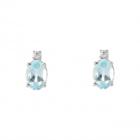 Puces d'oreilles Or Blanc 750 Topaze bleue traitée Ovale 6x4mm et Oxyde de zirconium