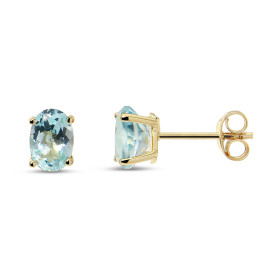 Puces d oreilles Or jaune 375 Topaze bleue Ovale 7x5mm Puces d oreilles Or jaune 375 (9 carats) Pierres ovales 7x5mm (0,65...