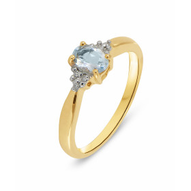 Solitaire Aigue marine et Diamant en Or Jaune 375. Cette jolie monture est ornée d'une pierre ovale de 6x4mm. 3 petits dia...