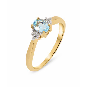 Solitaire Topaze Bleue Traitée et Diamant en Or Jaune 375. Cette jolie monture est ornée d'une pierre ovale de 6x4mm. 3 pe...