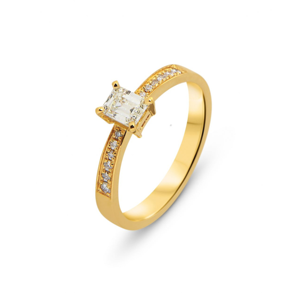 Bague Solitaire diamant taille émeraude en or jaune 750 Ref. 46546 Bague Solitaire diamant taille émeraude en or jaune 750 Ref. 46546